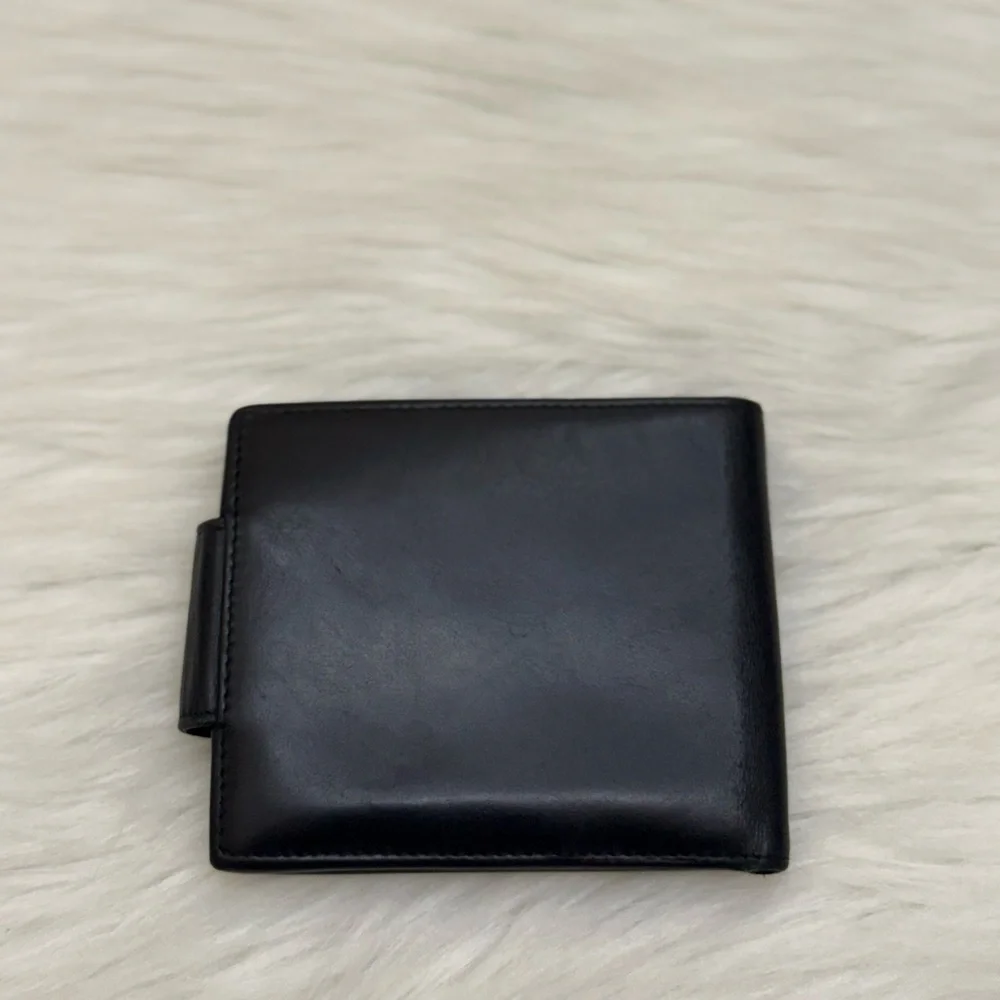 SALVATORE FERRAGAMO - BLACK LEATHER GOLD PLATED SECURE CLOSURE BIFOLD WALLET